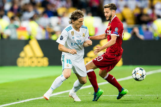 Luka Modric of Real Madrid and Adam Lallana of Liverpool