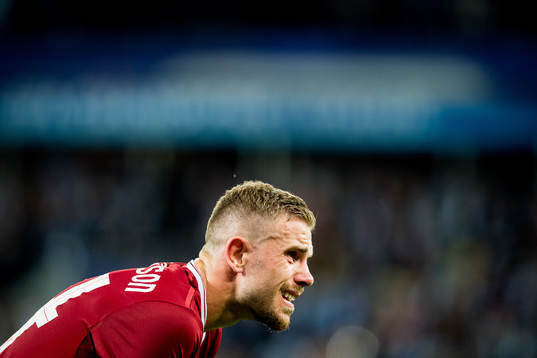 Jordan Henderson of Liverpool looks dejected