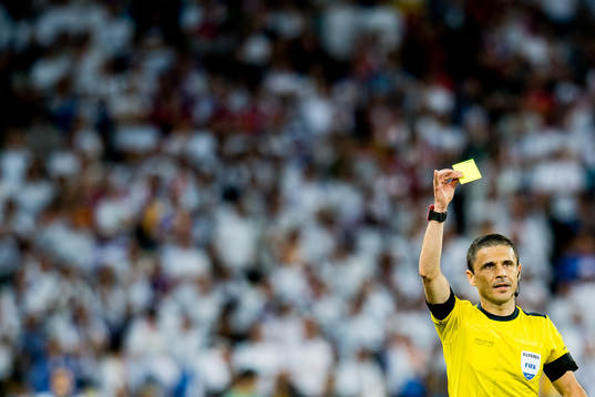 Referee Milorad Mazic of Serbia