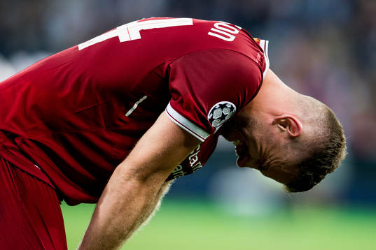 Jordan Henderson of Liverpool looks dejected