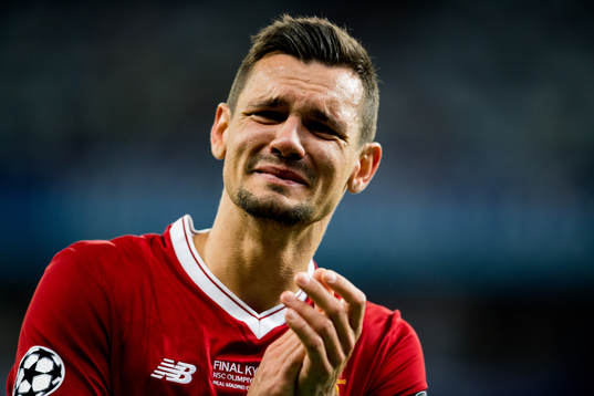 Dejan Lovren of Liverpool looks dejected