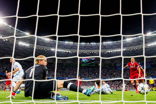 Karim Benzema of Real Madrid scores a disallowed goal