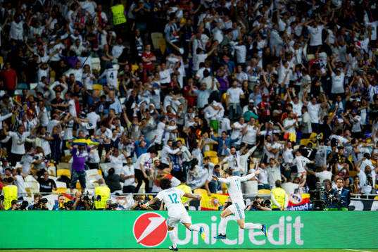 Gareth Bale of Real Madrid celebrates with teammate Marcelo