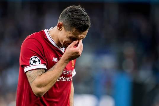Dejan Lovren of Liverpool looks dejected