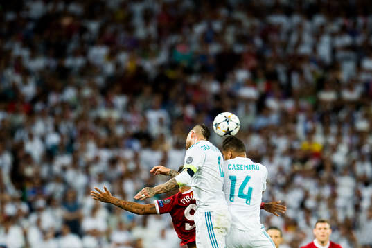 Roberto Firmino of Liverpool, Sergio Ramos and Casemiro of