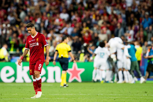 Roberto Firmino of Liverpool looks dejected