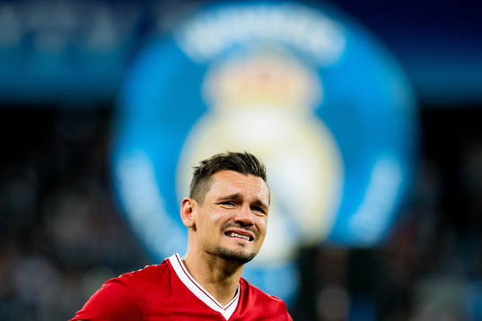 Dejan Lovren of Liverpool looks dejected