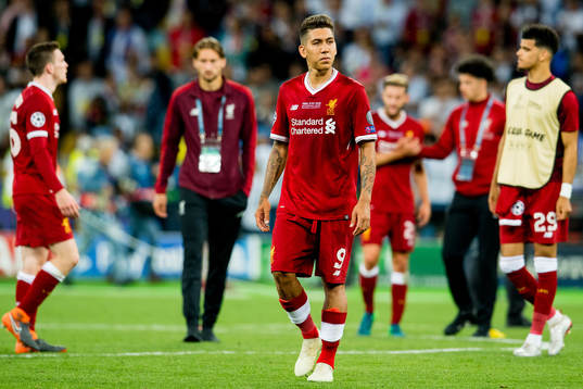 Roberto Firmino of Liverpool looks dejected