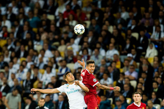 Casemiro of Real Madrid and Roberto Firmino of Liverpool