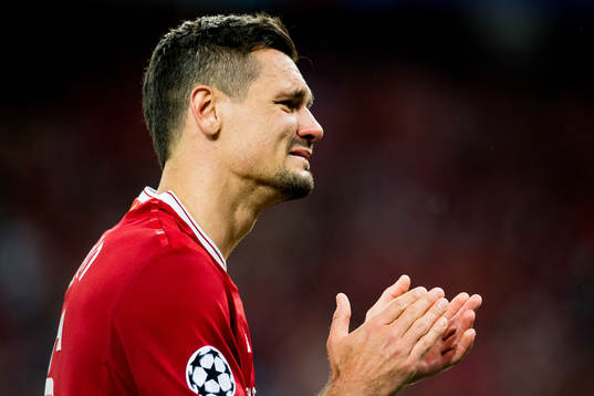 Dejan Lovren of Liverpool looks dejected
