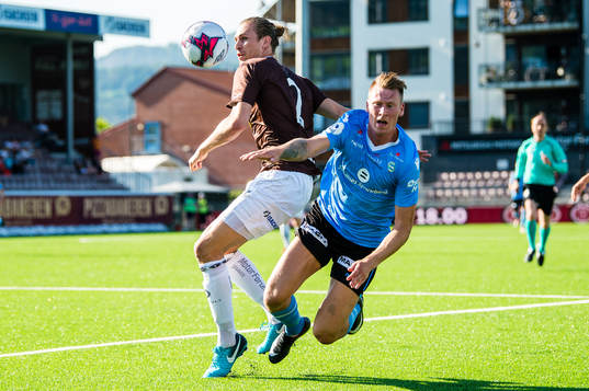 Quint Arie Jansen of Mjøndalen and Kent Håvard Eriksen of