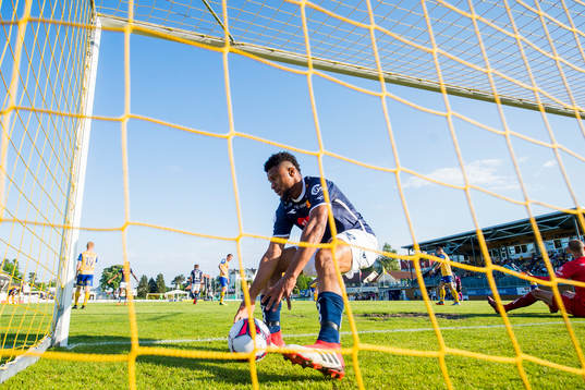 Aniekpeno Udoh of Viking celebrates