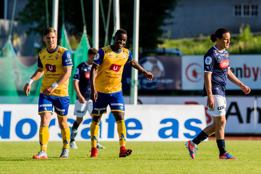 Espen Knudsen and Brice Wembangomo of Jerv celebrate the