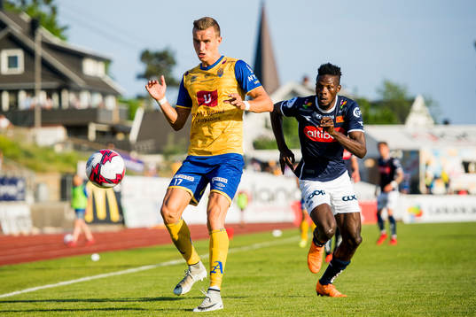 Martin Hoel Andersen of Jerv and Usman Sale of Viking