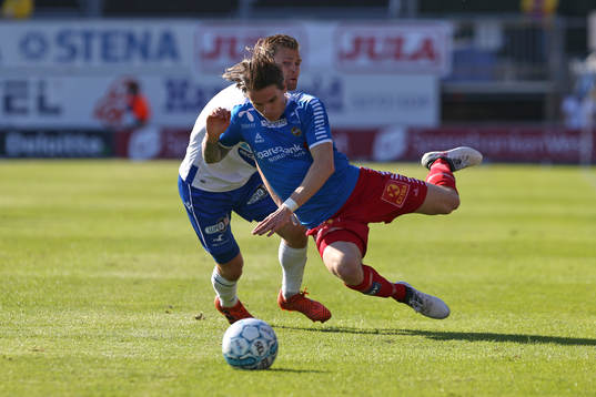 Robert Taylor from Tromsø in action against Sondre