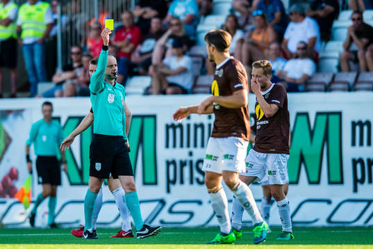 Mads Westlie Gundersen of Mjøndalen gets a yellow card