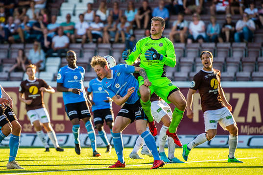 Vegard Aasen of Sandnes Ulf and Lukas Jonsson of Mjøndalen