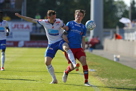 Robert Taylor from Tromsø in action against Kristoffer