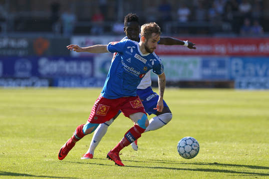 Daniel Berntsen from Tromsø in action against Babajide