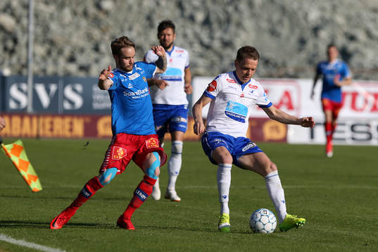 Daniel Berntsen of Tromsø in action against Joakim Nilsen