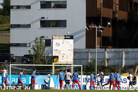 A view of the action showing the surrounding buildings