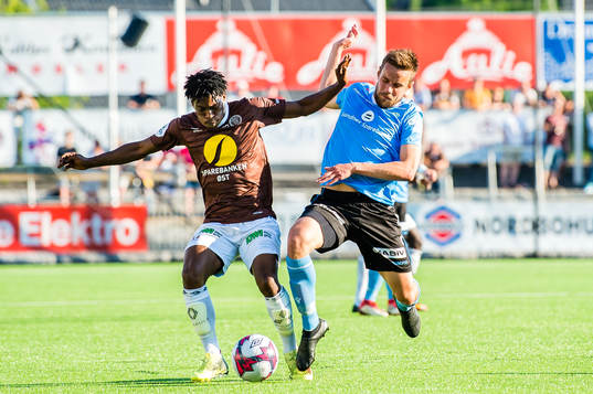 Vamouti Diomande of Mjøndalen and Remi Johansen of Sandnes