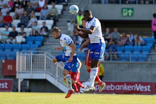 Runar Espejord of Tromsø in action against Sondre Tronstad