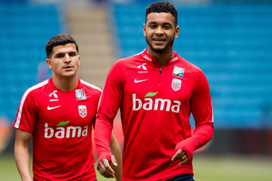 Tarik Elyounoussi and Joshua King of Norway