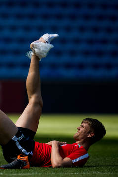Kristoffer Ajer of Norway with an injury