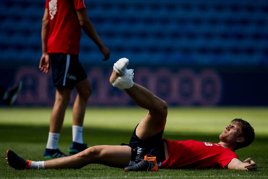 Kristoffer Ajer of Norway with an injury