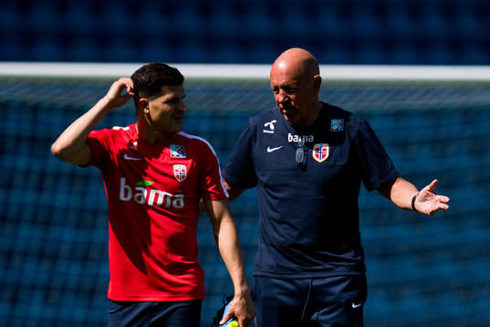 Tarik Elyounoussi of Norway and Nils Johan Semb