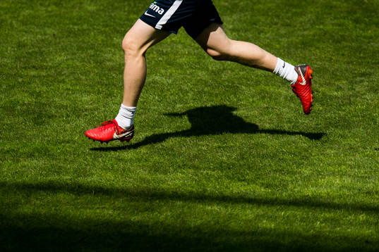 Feet and shoes of a player