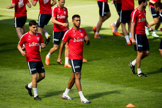 Tarik Elyounoussi and Joshua King of Norway
