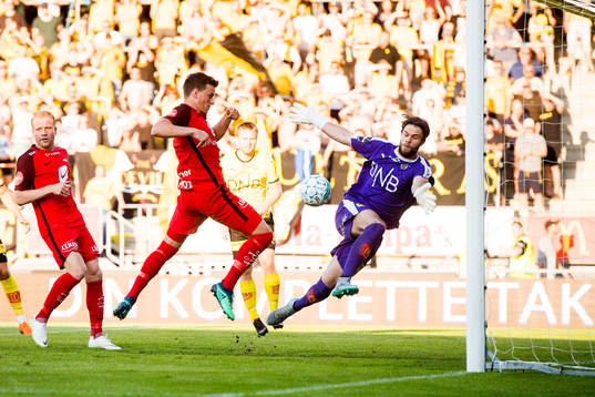 Jonas Grønner of Brann and goalkeeper Marko Maric of