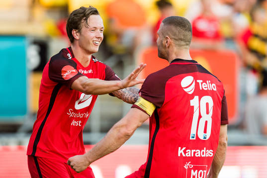 Fredrik Haugen and Azar Karadas of Brann celebrate the 1-1