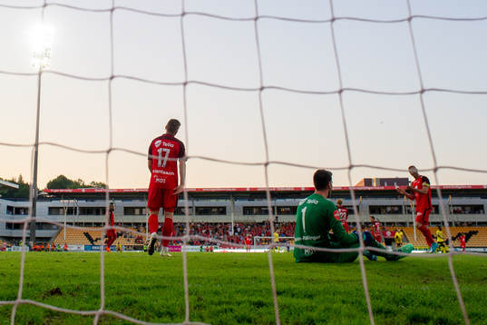 Gilli Rolantsson and goalkeeper Samuel Sahin-Radlinger of