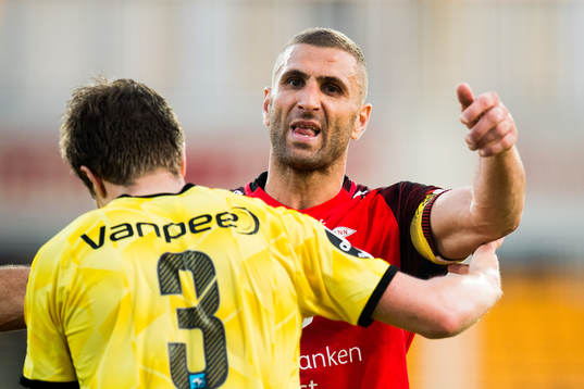 Simen Kind Mikalsen of Lillestrøm and Azar Karadas of Brann