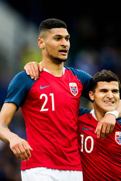 Bjørn Maars Johnsen and Tarik Elyounoussi of Norway
