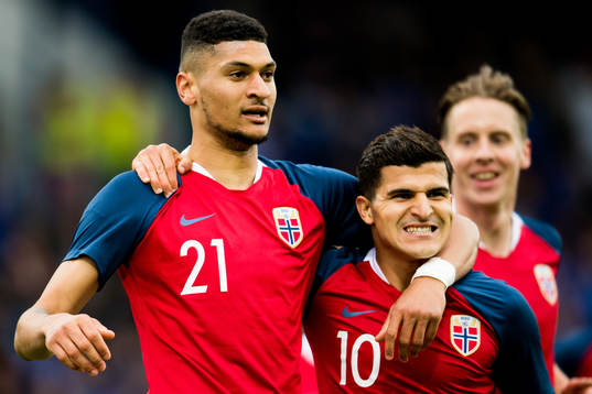 Bjørn Maars Johnsen and Tarik Elyounoussi of Norway