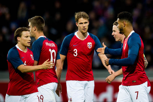 Joshua King of Norway celebrates with teammates