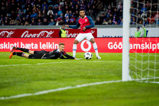 Joshua King of Norway scores the 2-2 goal behind goalkeeper
