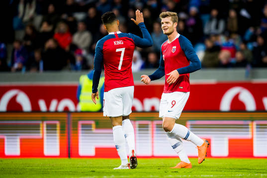 Alexander Sørloth of Norway celebrates with Joshua King of