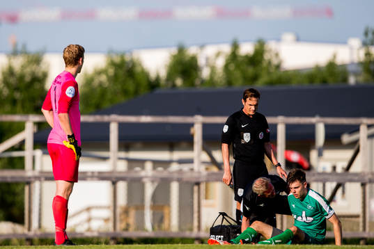 Peter Sørensen Nergaard of Nest-Sotra with an injury