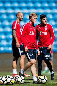 Mats Møller Dæhli and Tarik Elyounoussi of Norway
