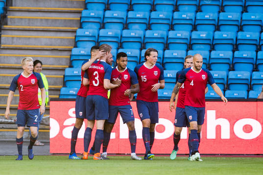 Joshua King of Norway celebrates with teammates