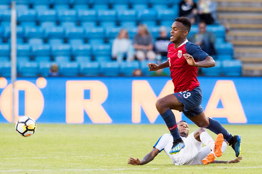 Alberto Quintero of Panama and Ola Kamara of Norway