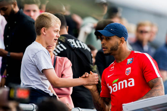 Joshua King of Norway with a fan