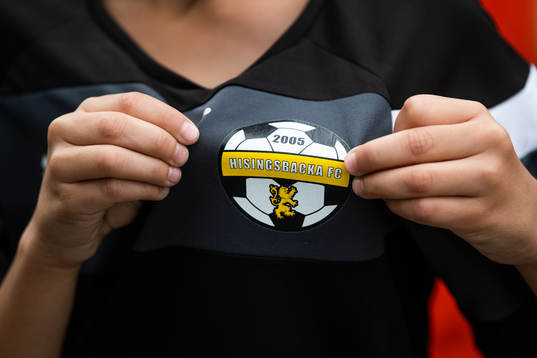 Hisingsbacka FCs klubbmärke på en tröja