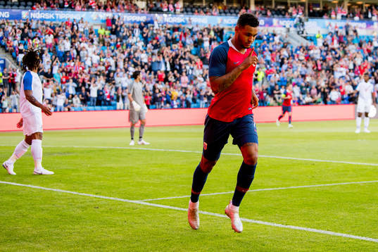 Joshua King of Norway celebrates scoring 1-0