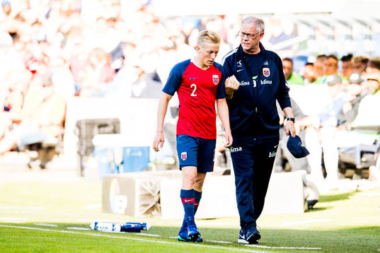 Birger Meling of Norway and Lars Lagerbäck, head coach of